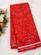 Orange color Ajrakh bandini modal mirror work saree