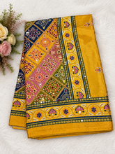 Yellow color Ajrakh bandini modal mirror work saree